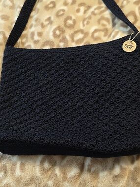 The Sak Black Crochet Shoulder Bag with Logo Charm